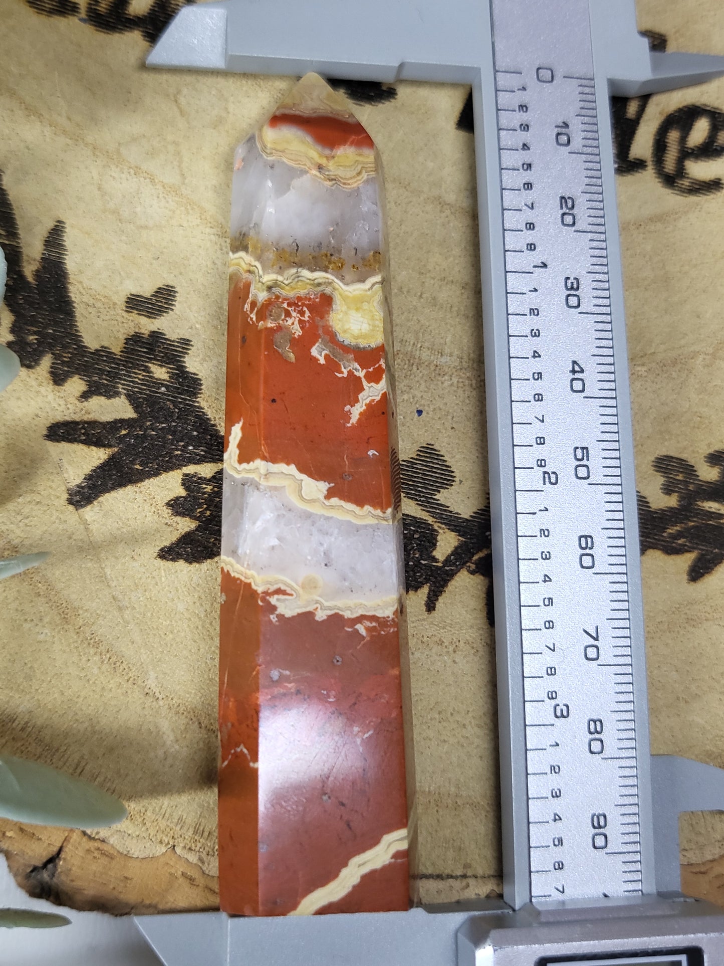 Red japser with quartz point