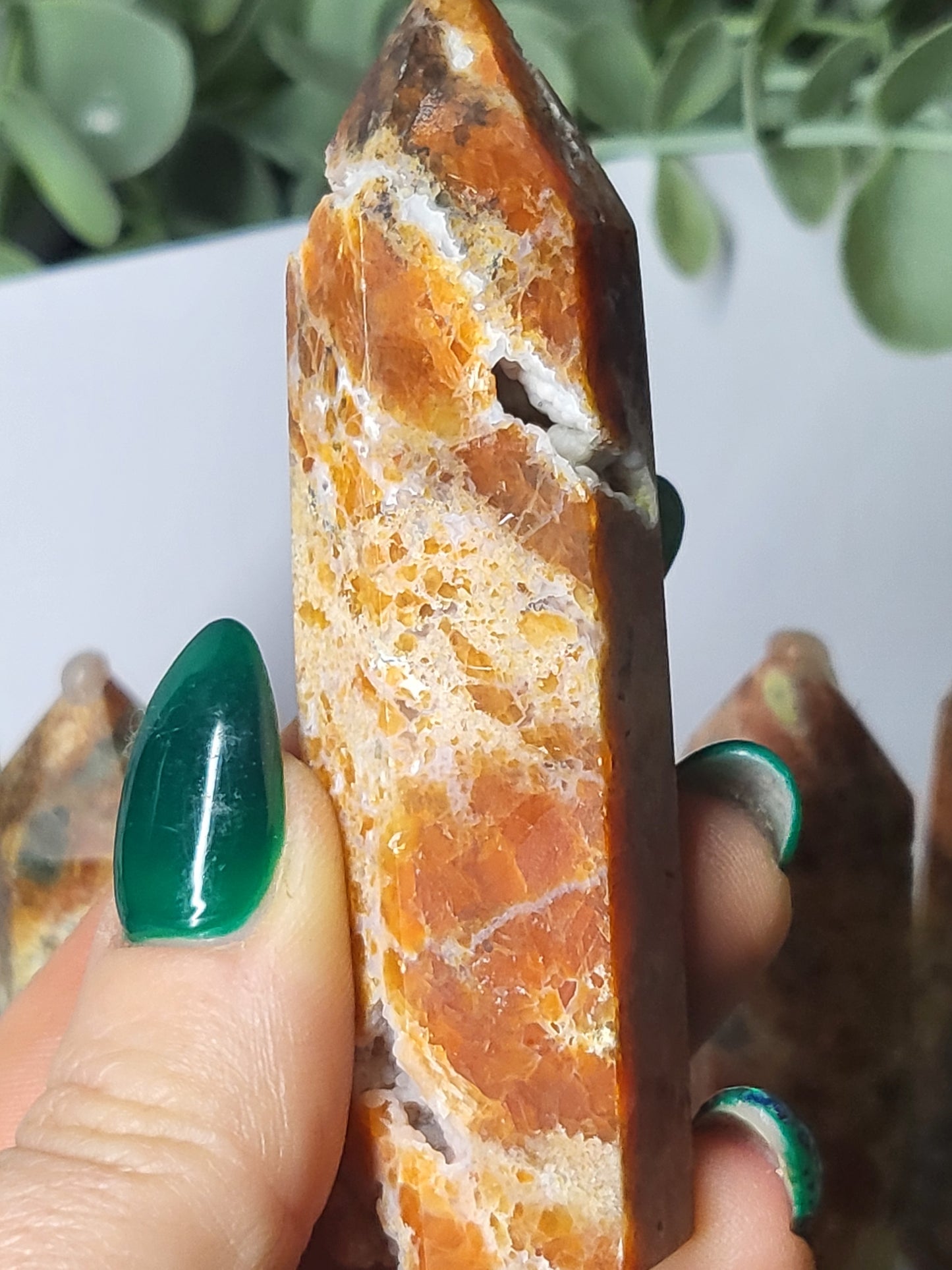 Orange Calcite and Apatite point