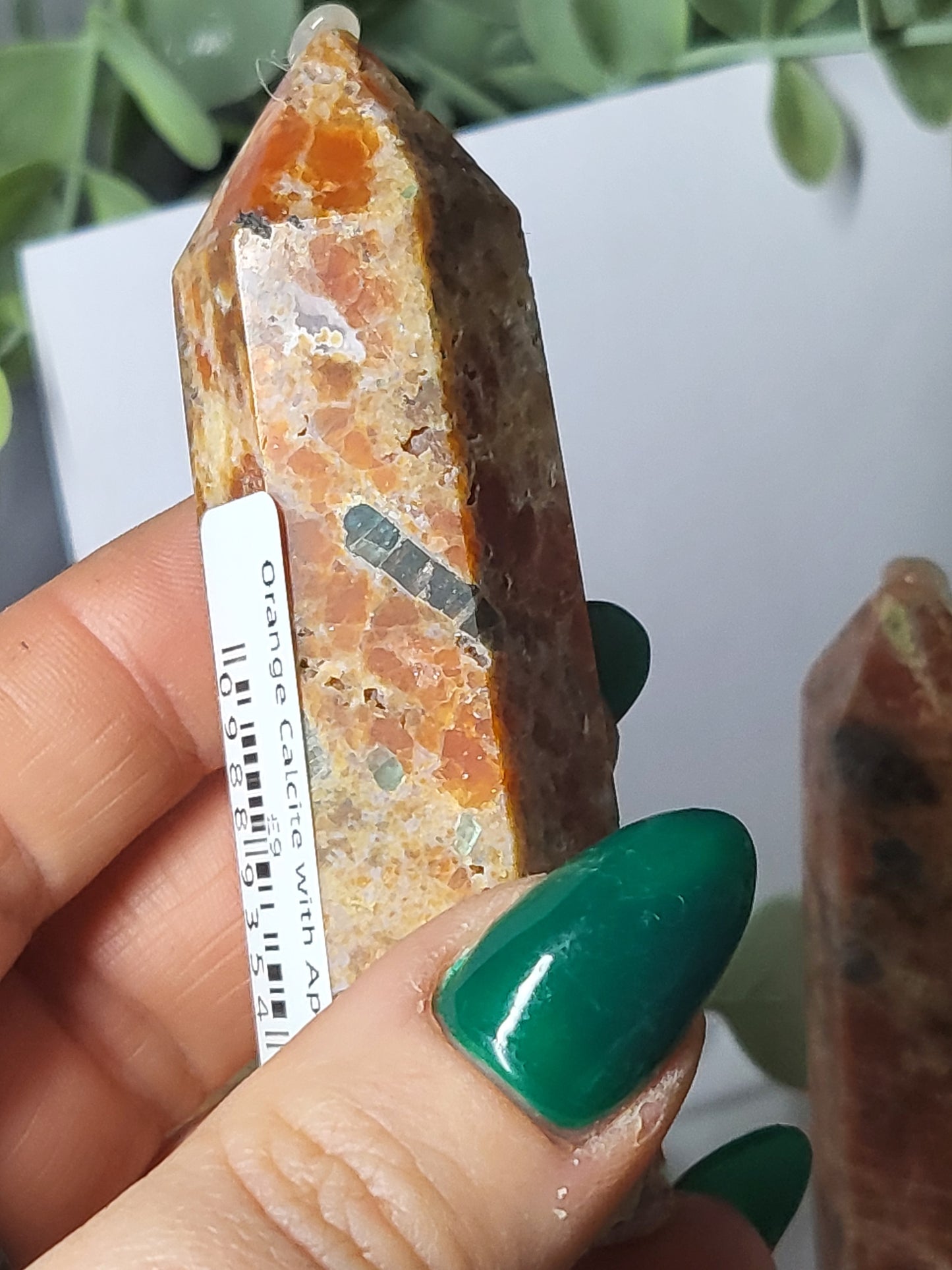 Orange Calcite and Apatite point