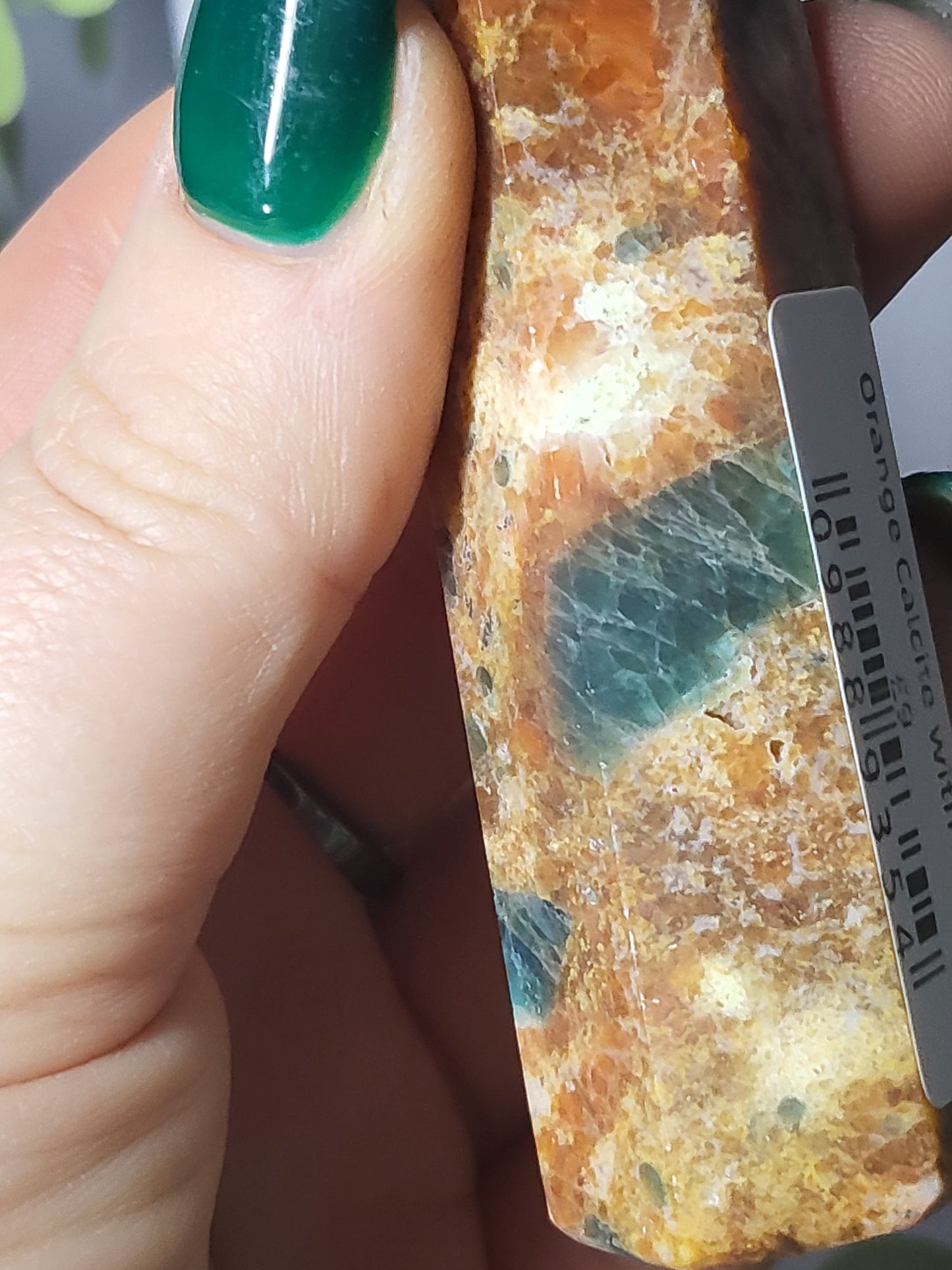 Orange Calcite and Apatite point