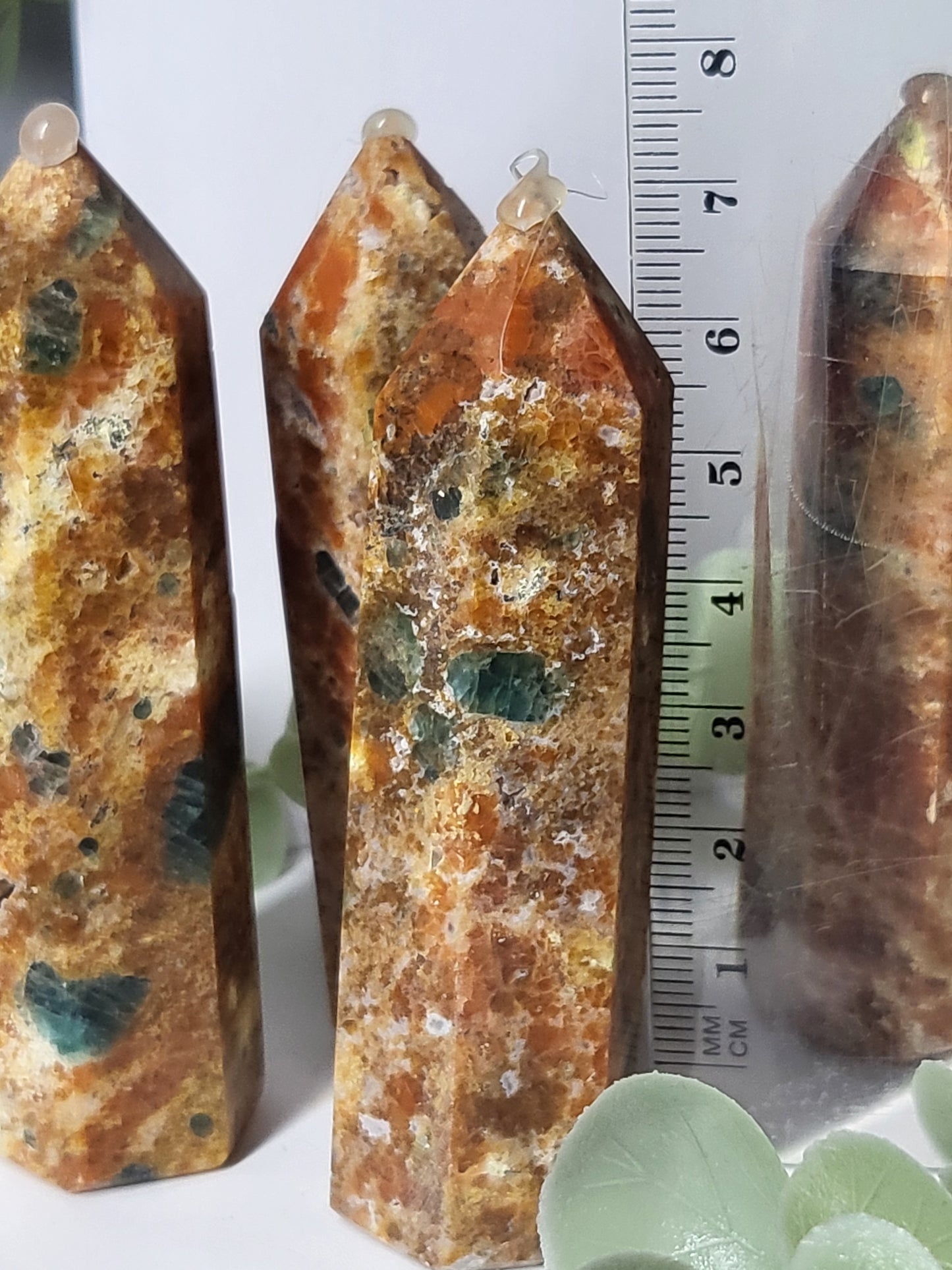 Orange Calcite and Apatite point