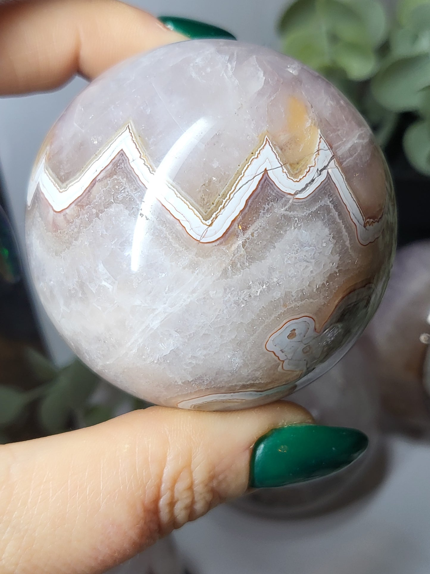 Amethyst with banded agate sphere