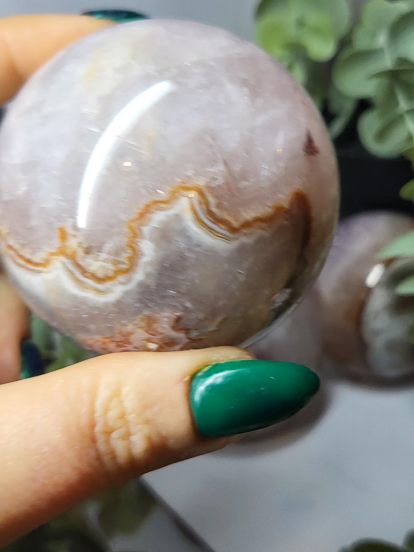 Amethyst with banded agate sphere