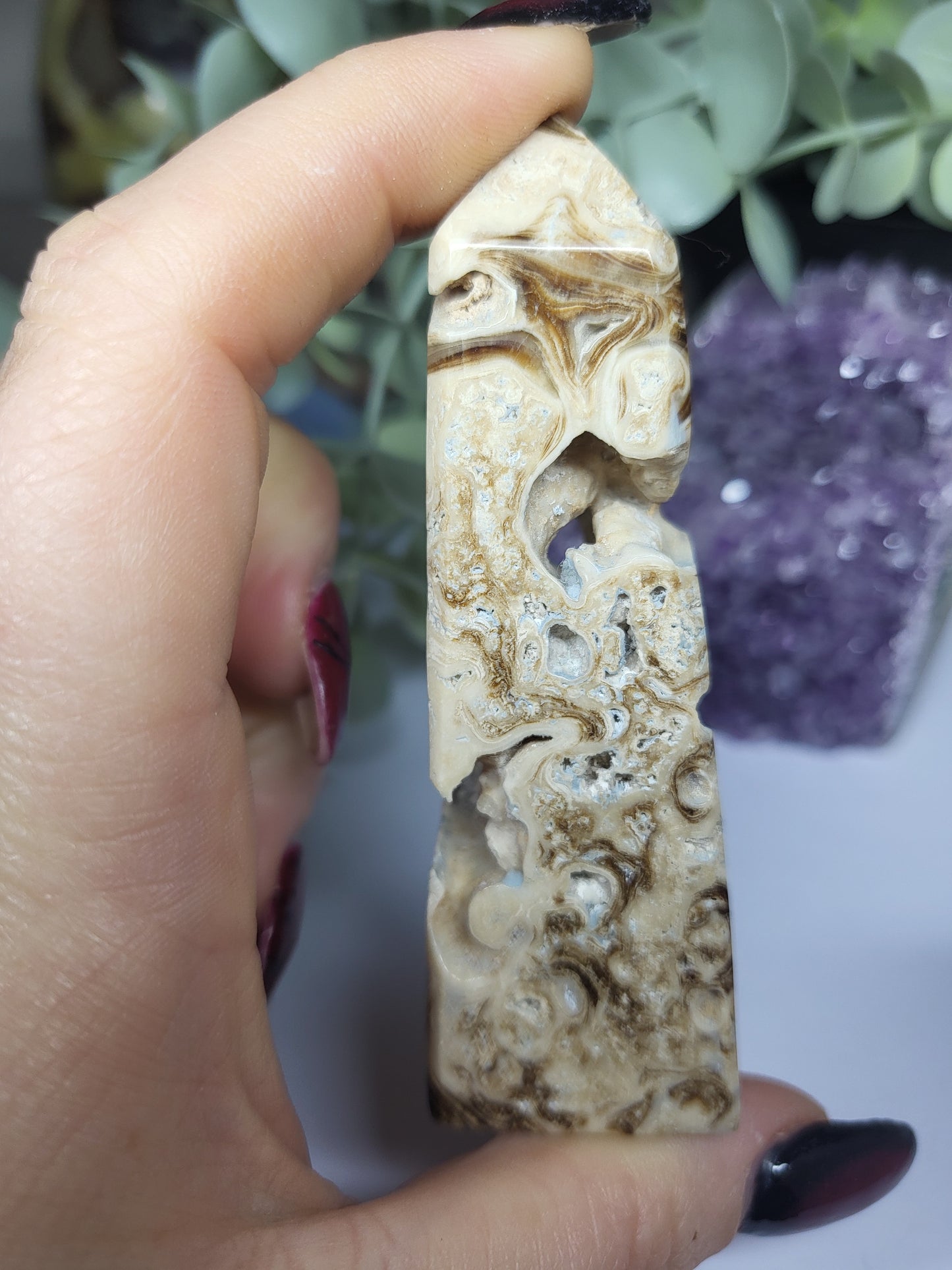 Chocolate calcite point