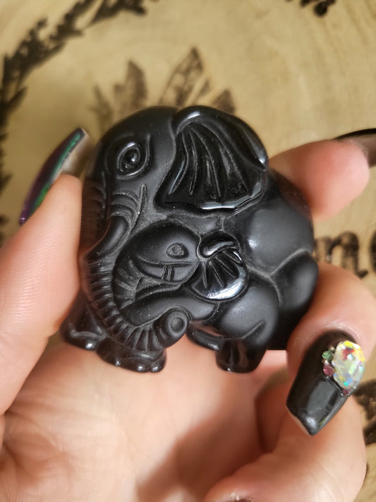 Obsidian elephant with baby