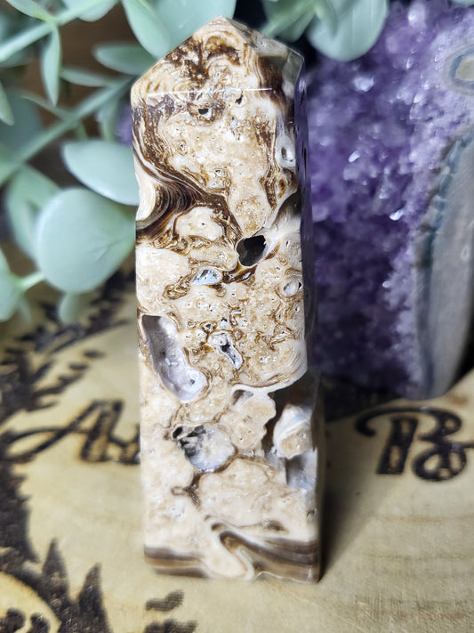 Chocolate calcite point