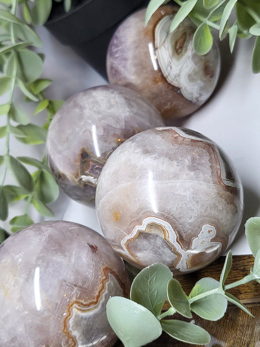 Amethyst with banded agate sphere