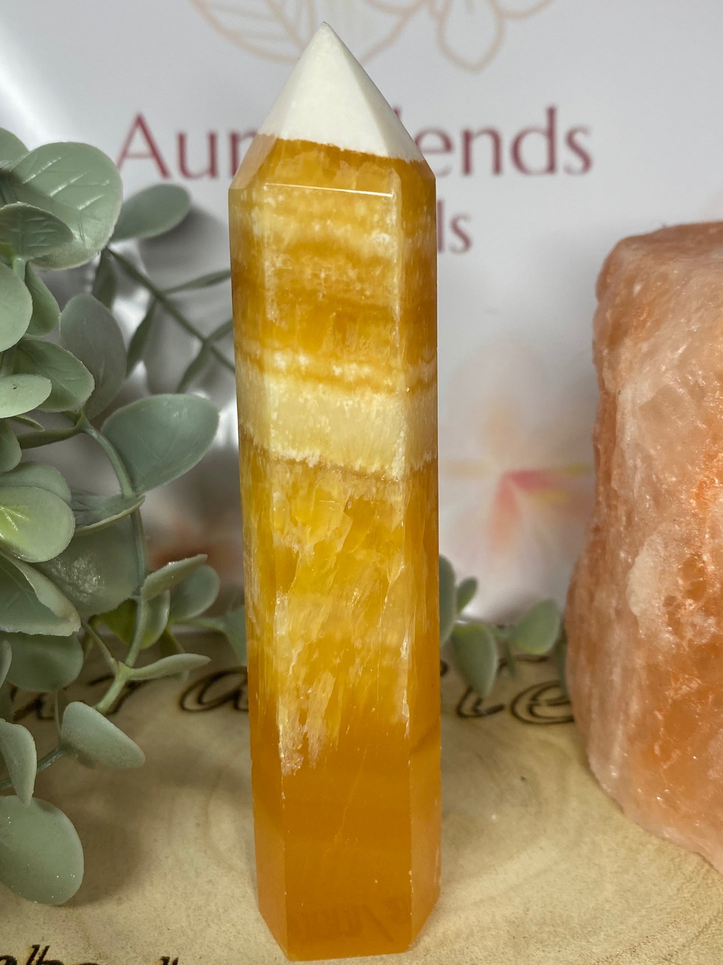 Orange calcite point