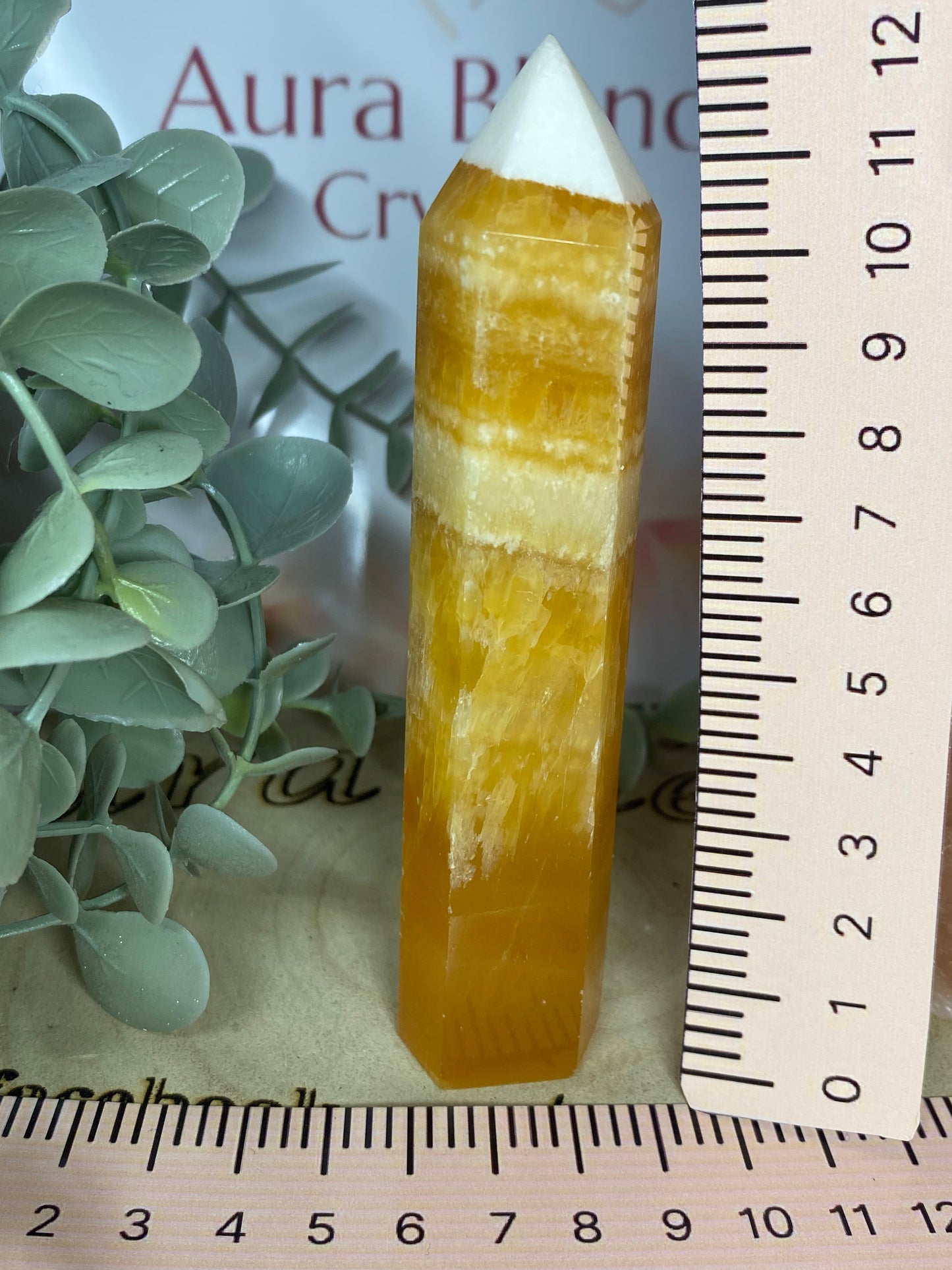 Orange calcite point